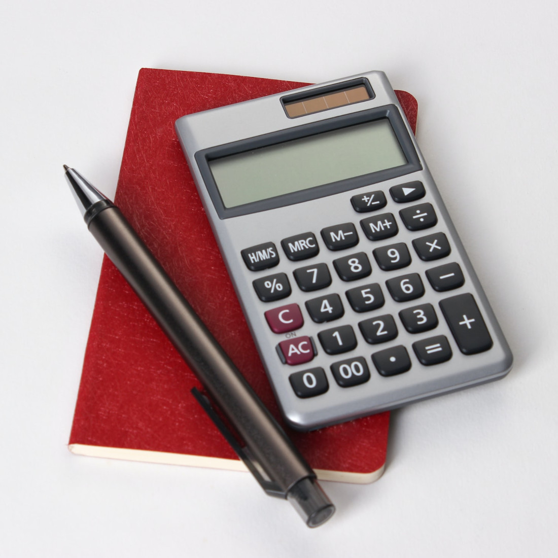 Calculator and pen.